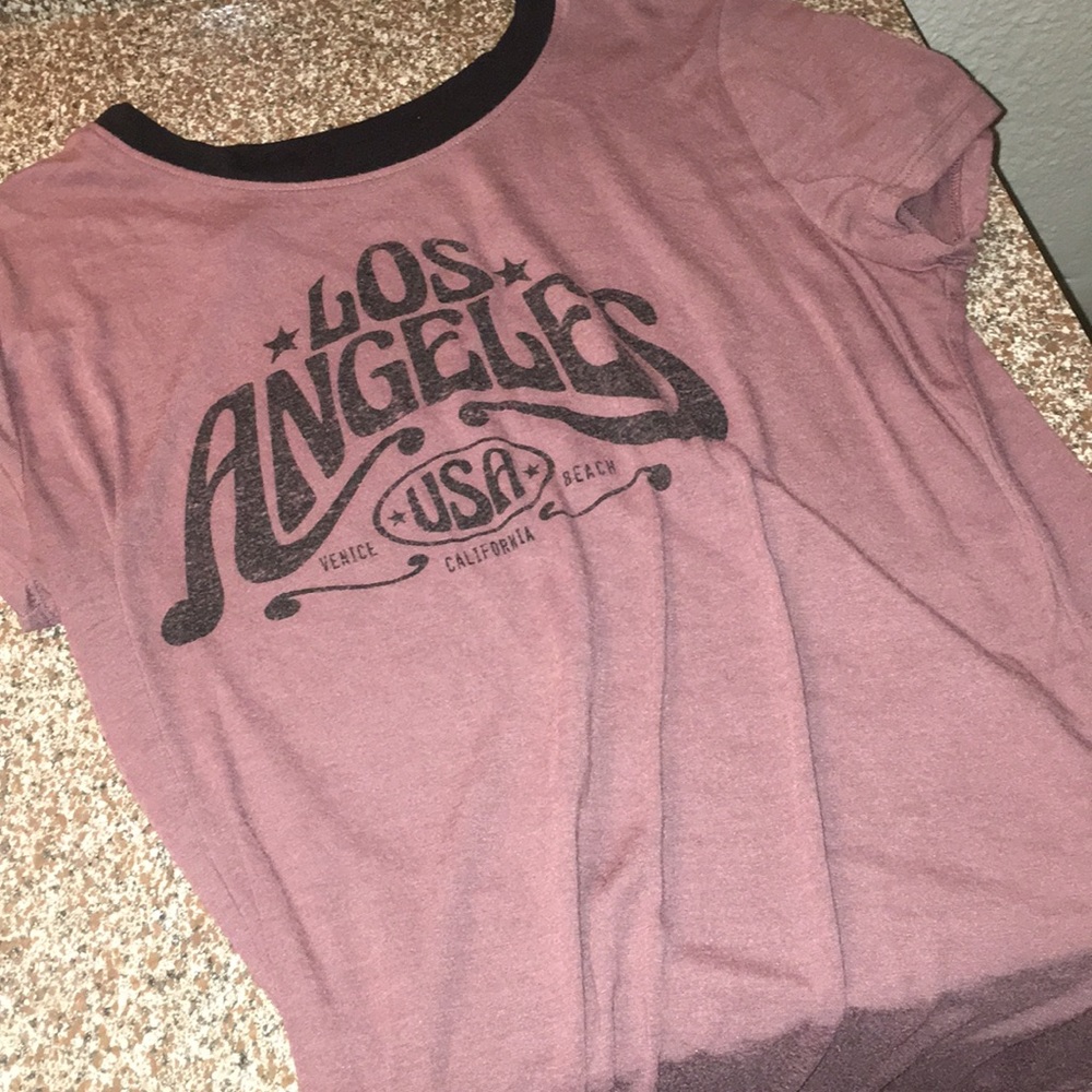 Red top says “Los Angeles” in vintage lettering.